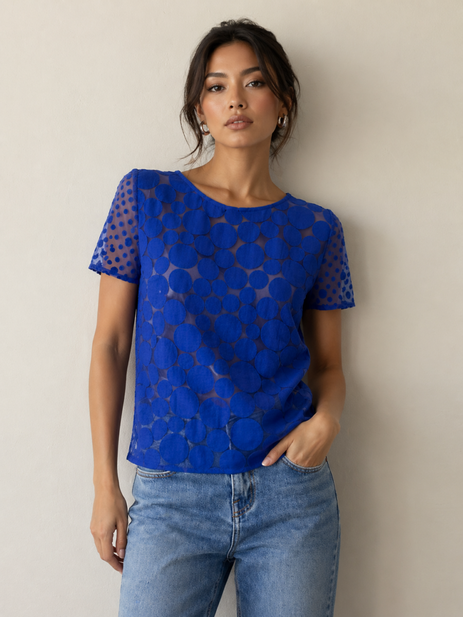 Blusa azul translúcida con textura circular Woman&Now